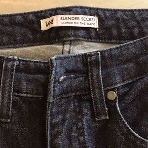 Slender Secrets Lee jeans. 8 short. Almost straight, slight flare at bottom.